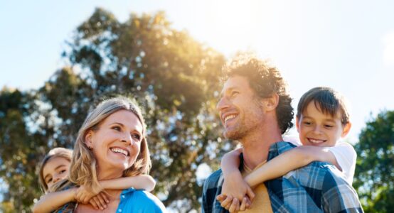 A happy family outdoors.