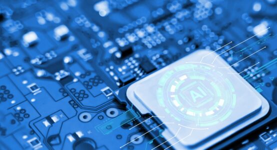 A computer central processing unit with “AI” written on it.