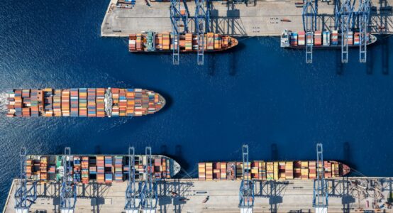 An aerial view of a cargo ship harbour.