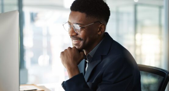 A man working at a computer.
