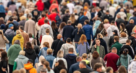 A crowd of people walking.