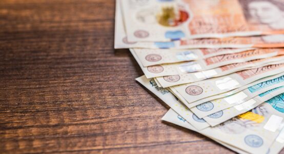 UK bank notes on a table.